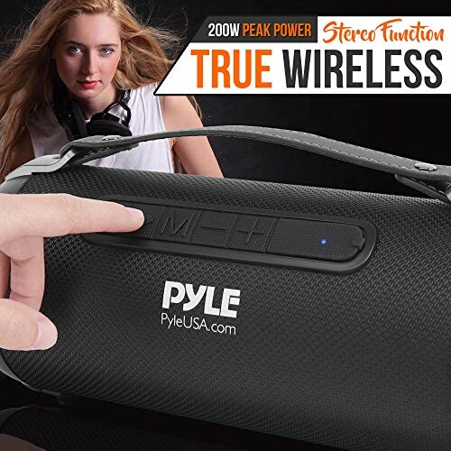 Person adjusting a portable wireless speaker with 200W peak power.