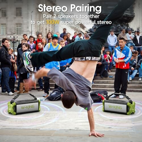 Street dancer performing with onlookers and portable speakers.